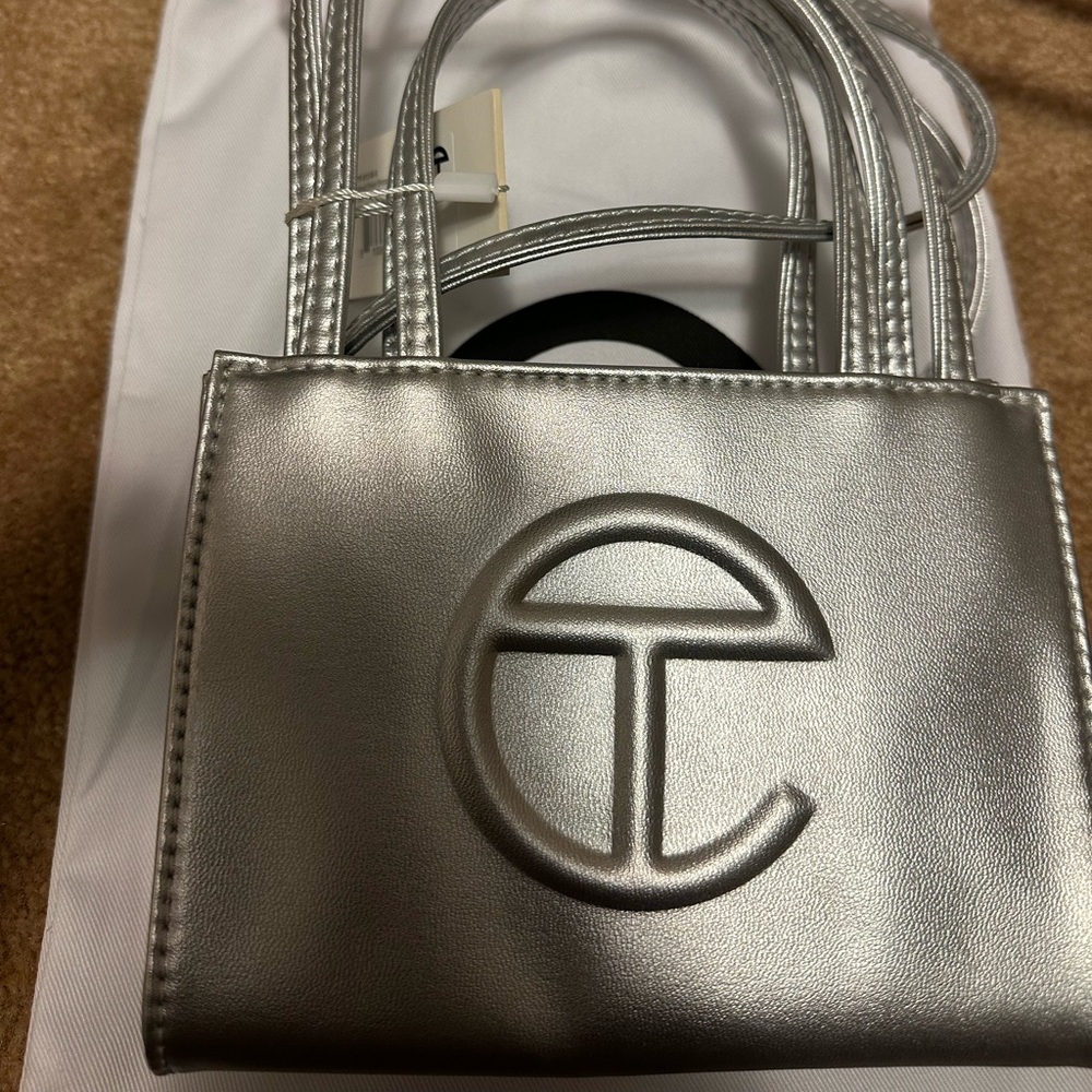 Beautiful silver Telfar mini hand bag